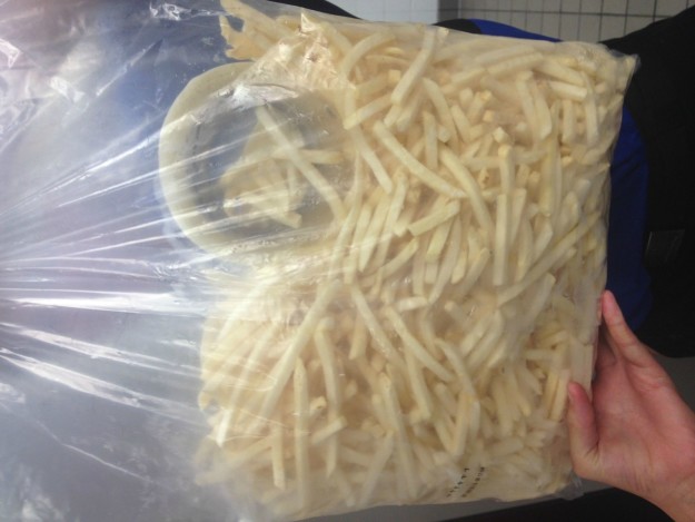 A roll of tape sealed inside a bag of McDonald's French fries.