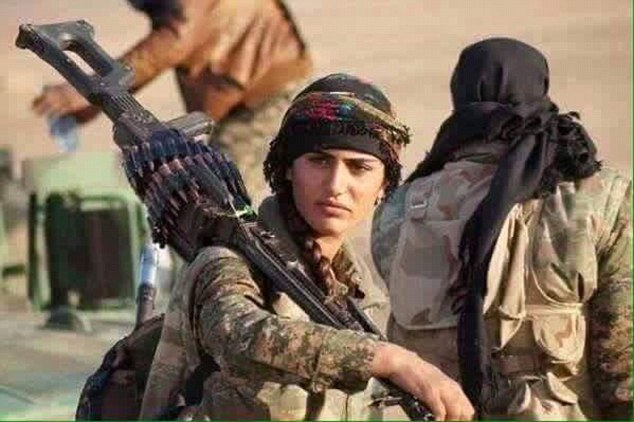 A woman fighter dubbed the 'Kurdish Angelina Jolie' (pictured) for her resemblance to the Hollywood superstar has died fighting ISIS, it has been claimed