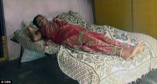 The 27-year-old victim - named as S Girija by police in Nellore, eastern India - collapsed in agony when her husband's mother and her sister-in-law poured a powerful acid on her baby bump