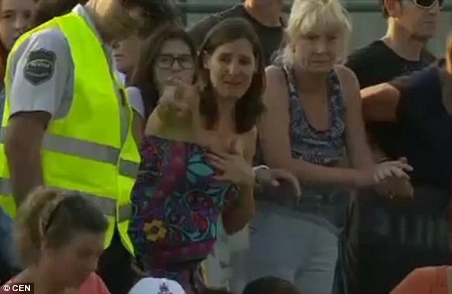 The woman started making a noise, interrupting the match, when her child wandered away