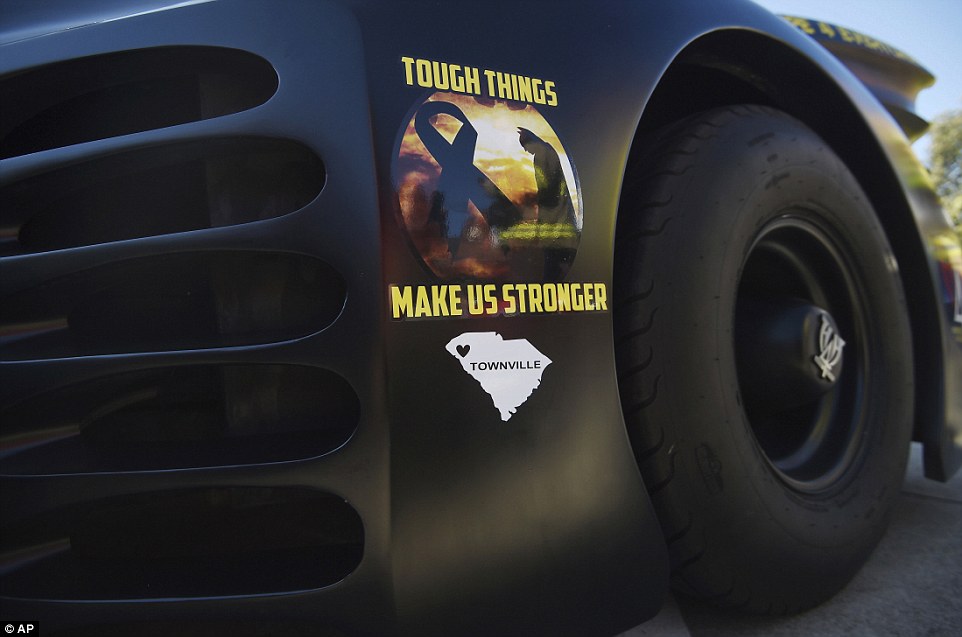 A sticker remember the Townville Elementary School shooting is affixed to the Heroes 4 Higher Batmobile