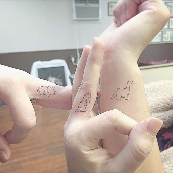 Who says best friends are limited to two individuals? If you have a group of 3 or more, try getting variations of a tattoo like these three dinosaurs! 