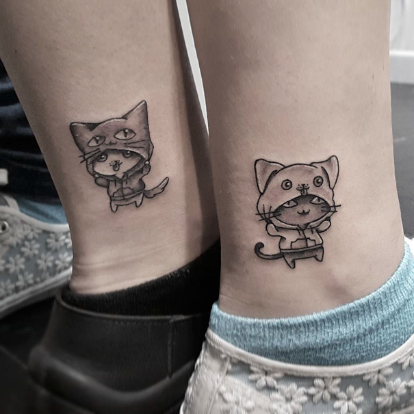 A cute little tattoo that represents not only your mutual love for cats but also that you guys are basically just like each other inside and out.