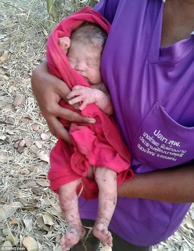 Newborn baby Aidin who was discovered buried alive in a shallow grave after being stabbed 14 times in Thailand 