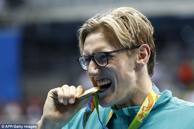 Swimmer Mack Horton celebrates his Olympic gold medal after winning the 400m freestyle final at the 2016 Games in Rio de Janeiro in August