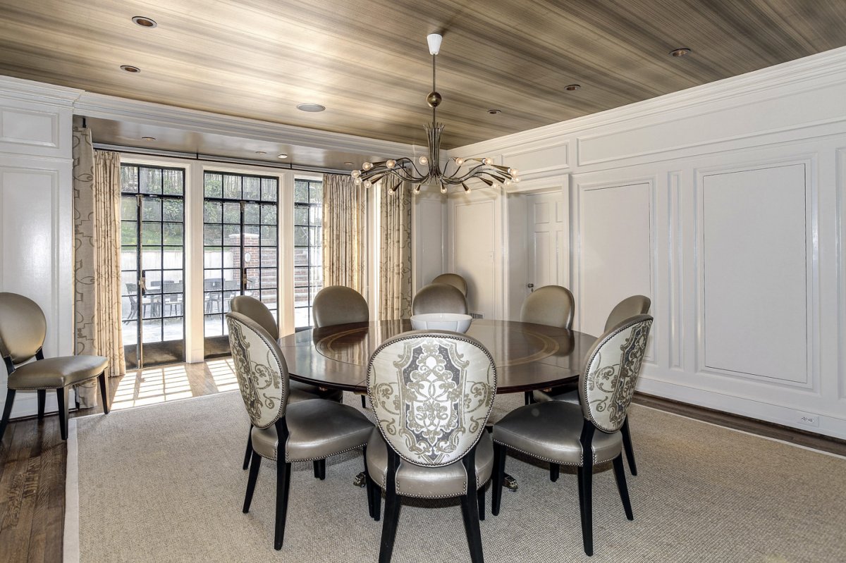 Next to that is a large dining room — perfect for dinner parties.