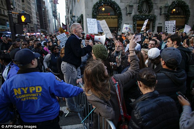 The NYPD has been working with the Secret Service to instill security measures around Trump Tower, which attracted the ire of protesters in the days following the election (pictured)