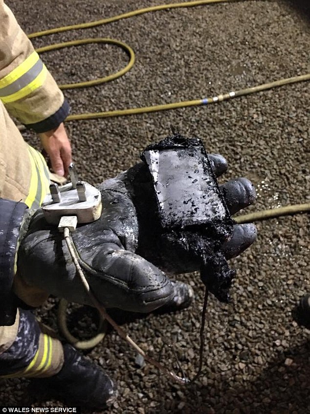 Warning: North Wales Fire and Rescue Service have released the images, including this one of her phone and charger, and encouraged people to buy genuine equipment