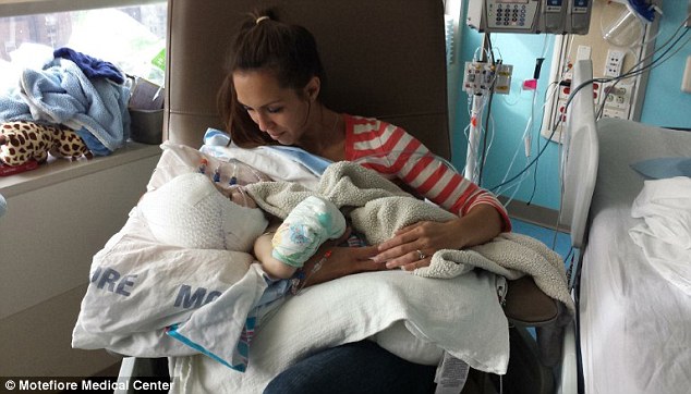 This is the moment Nicole McDonald was able to hold Jadon for the first time