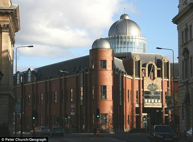 The man allegedly attacked his partner while she was on her hands and knees trying to relieve the pain of her contractions after going into labour at home, Hull Crown Court (pictured) heard
