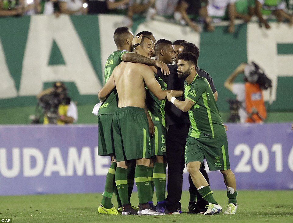 The team's players celebrate their win over San Lorenzo of Argentina in the semi-finals of the Copa Sudamericana 