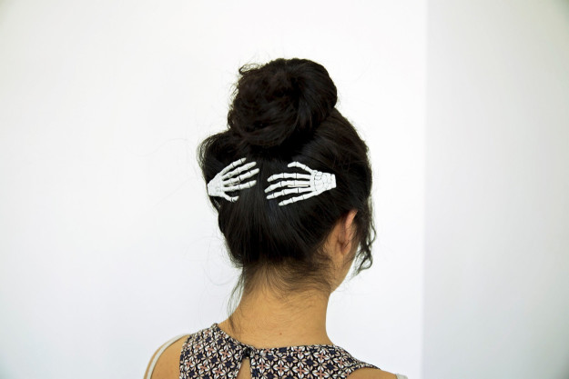 A pair of ~delicate~ skeleton hand clips to keep your mane in place.