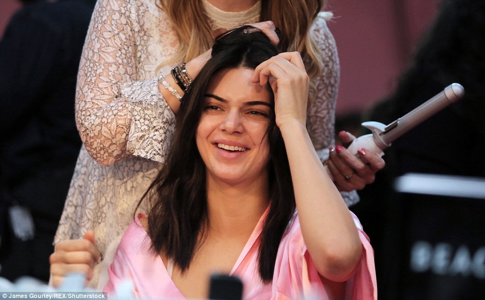 Having a giggle: Joining the backstage beauties was fellow member of the 'Instagram' supermodels, Kendall Jenner, who looked fresh-faced as she went make-up free