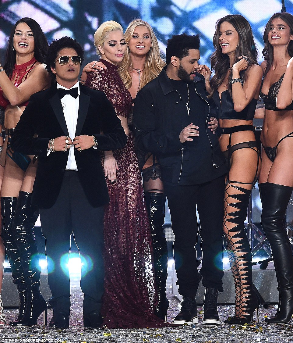 Eye eye! He was also spotted checking out Alessandra Ambrosio's bosom as he stood next to her, alongside fellow performers Lady Gaga and Bruno Mars and a host of models