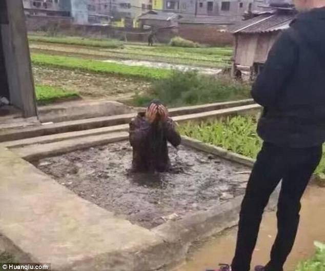 Publicly shamed: A would-be dog thief was thwarted by villagers who dumped him in a septic tank