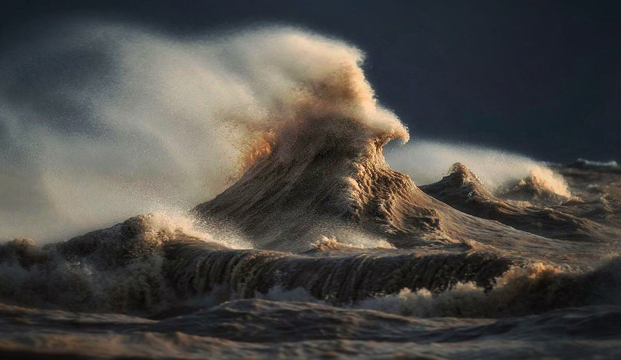 His goal was to capture the exact moment when lake waves driven by gusting winds collide with a rebound wave that's created when the water hits a pier and collection of boulders on the shore.