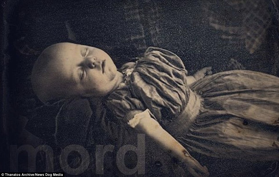 This image shows a child who could easily be sleeping. Her right hand appears wounded and her dress bloodstained but it is thought this effect was simply due to a corruption of the daguerreotype