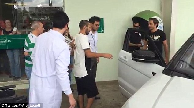 Ruschel was able to stand from his wheelchair as he headed for a car outside the hospital