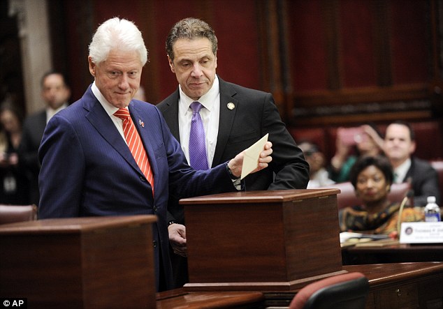 Token vote: Bill Clinton voted for his wife in New York - but it will not change the result, with the Republican on course to take the Electoral College