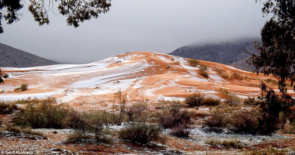 Karim captured the amazing moment snow fell on the red sand dunes in the world's largest hot desert