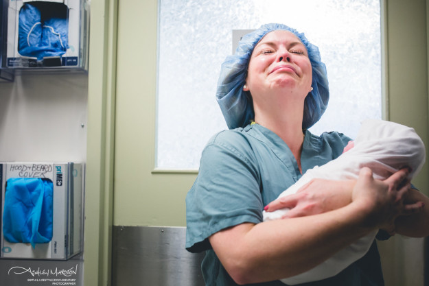 The beautiful moment when this mother — at long last and after much struggle — held her healthy baby born via surrogate.