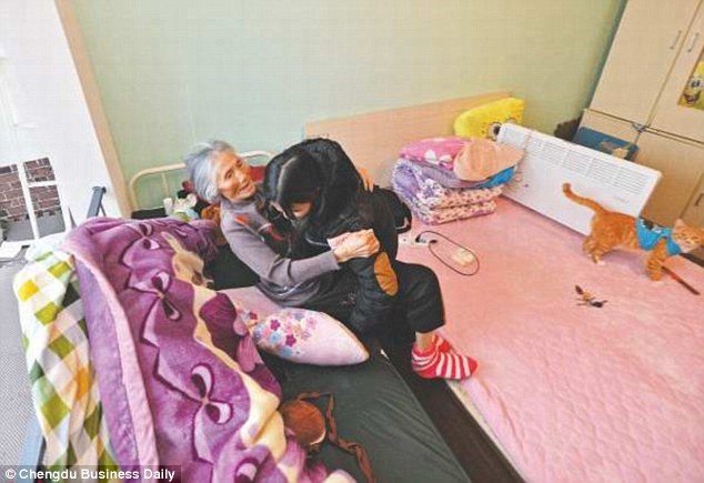 Liu and her grandmother live in a tiny rented room near Liu's university in Chengdu, China
