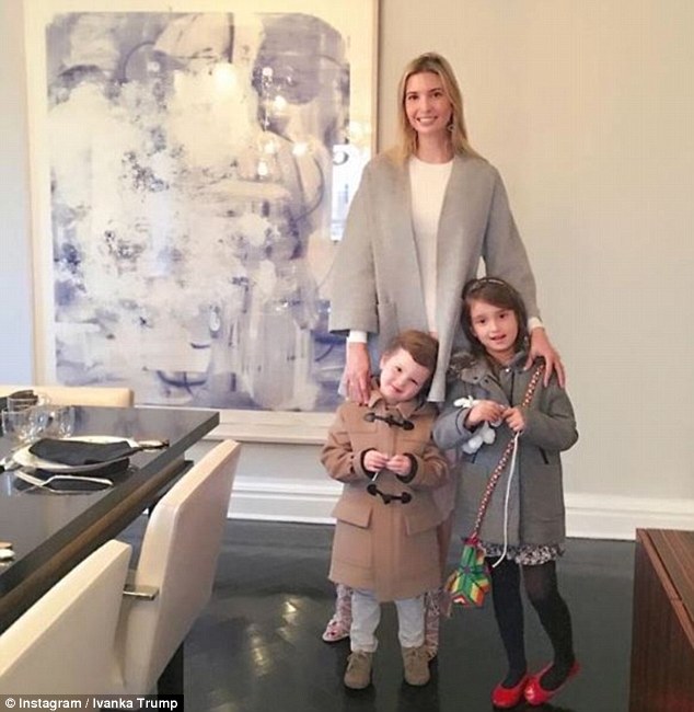 Ivanka is seen standing in front of one of her many paintings, with two of her children - Joseph Frederick and Arabella Rose