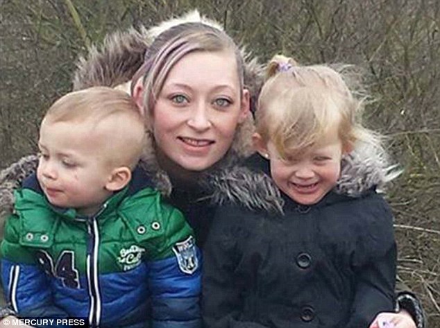 Her mother Kellie Curtis (pictured with Evia-Mae and her son Mason), 25, heard a deafening bang and rushed into the room when she found little Evie-Mae crying hysterically and covered in blood