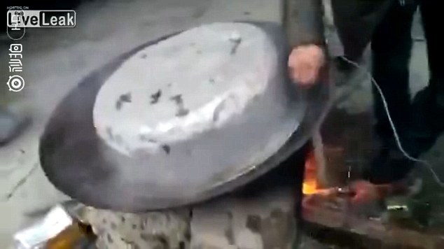 Three men in Henan province, China, have filmed themselves throwing a dog into a pot of boiling water before covering it over with a metal pan