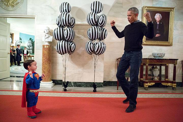 “The President was about to welcome local children for Halloween trick-or-treating when he ran into Superman Walker Earnest, son of Press Secretary Josh Earnest, in the Ground Floor Corridor of the White House. ‘Flex those muscles,’ he said to Walker.” 