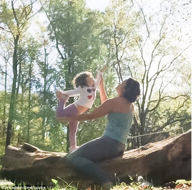 Instagram snaps show Mottajuice teaching her daughter sun salutations as they balance on a log