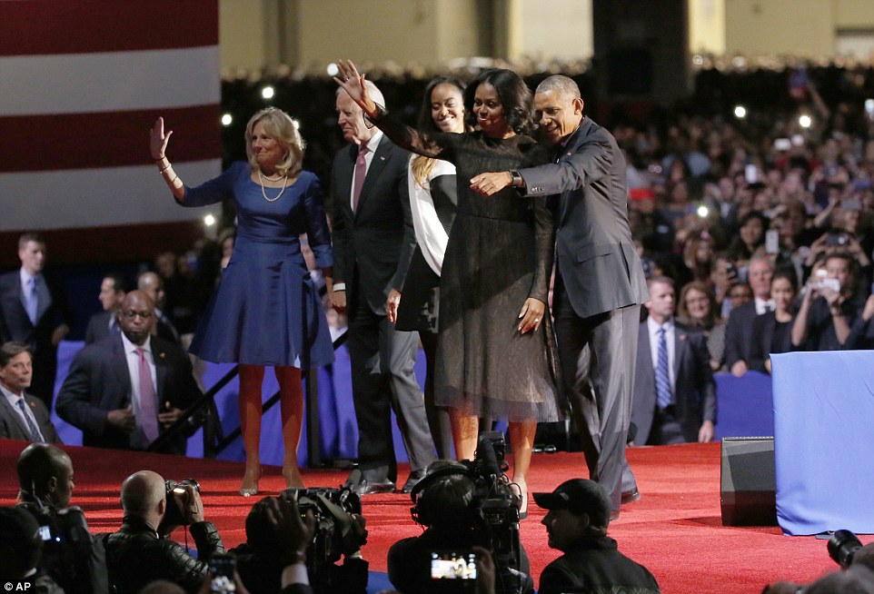 'Family': President Barack Obama is joined by First Lady Michelle Obama, daughter Malia Obama, Vice President Joe Biden and Dr. Jill Biden after giving his presidential farewell address at McCormick Place in Chicago