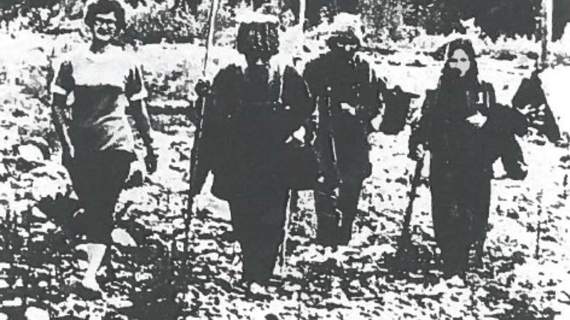 A Russian press photo of Karp Lykov (second left) with Dmitry and Agafia, accompanied by a Soviet geologist.