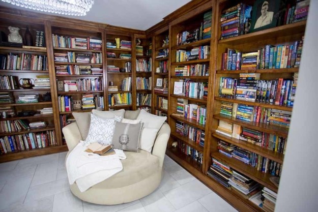 The house boasts five bedrooms and built-in bookshelves.
