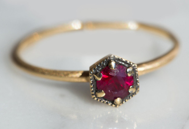 A delicate scarlet ruby ring that looks it belongs in a chest of family heirlooms.
