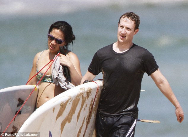 Mark Zuckerberg (pictured in a file photo with his wife Priscilla Chan) is suing Hawaiian families to force them to sell their land, a Honolulu newspaper reported Wednesday