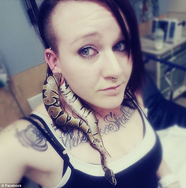 Quite the situation: Ashley Glawe found herself in an Oregon emergency room last week after her pet snake got stuck in her earlobe