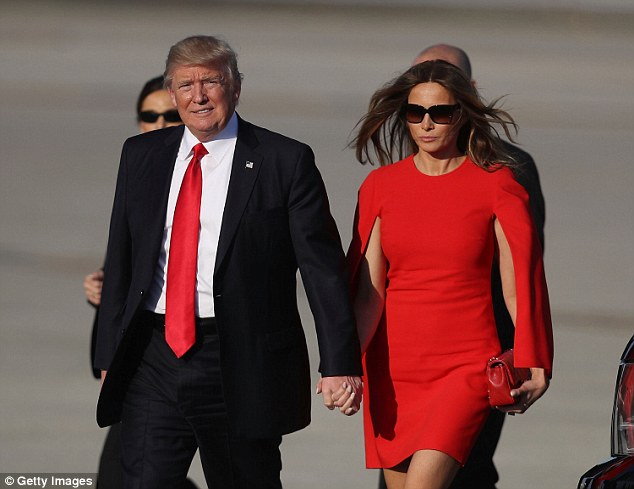 Donald Trump and his wife Melania had an awkward hand-hold Friday on the tarmac of the Palm Beach International Airport, after he arrived for a stay at his Mar-A-Lago resort