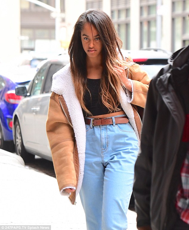 Malia Obama wore high-waisted jeans and a crop top as she showed up to work Wednesday morning to intern at the Weinstein Company in New York City