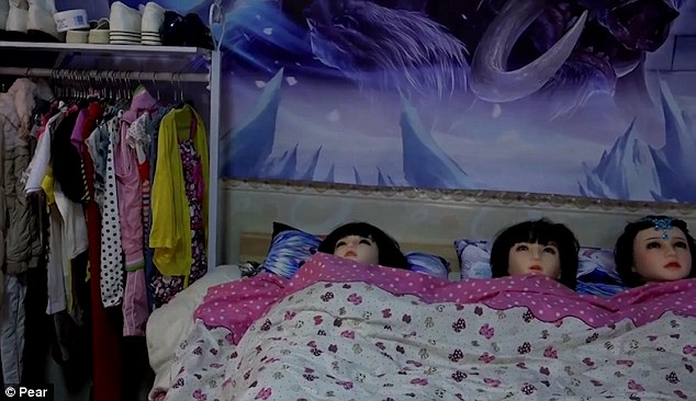 Li's seven dolls have their own beds, own wardrobes and own lifestyle at his house