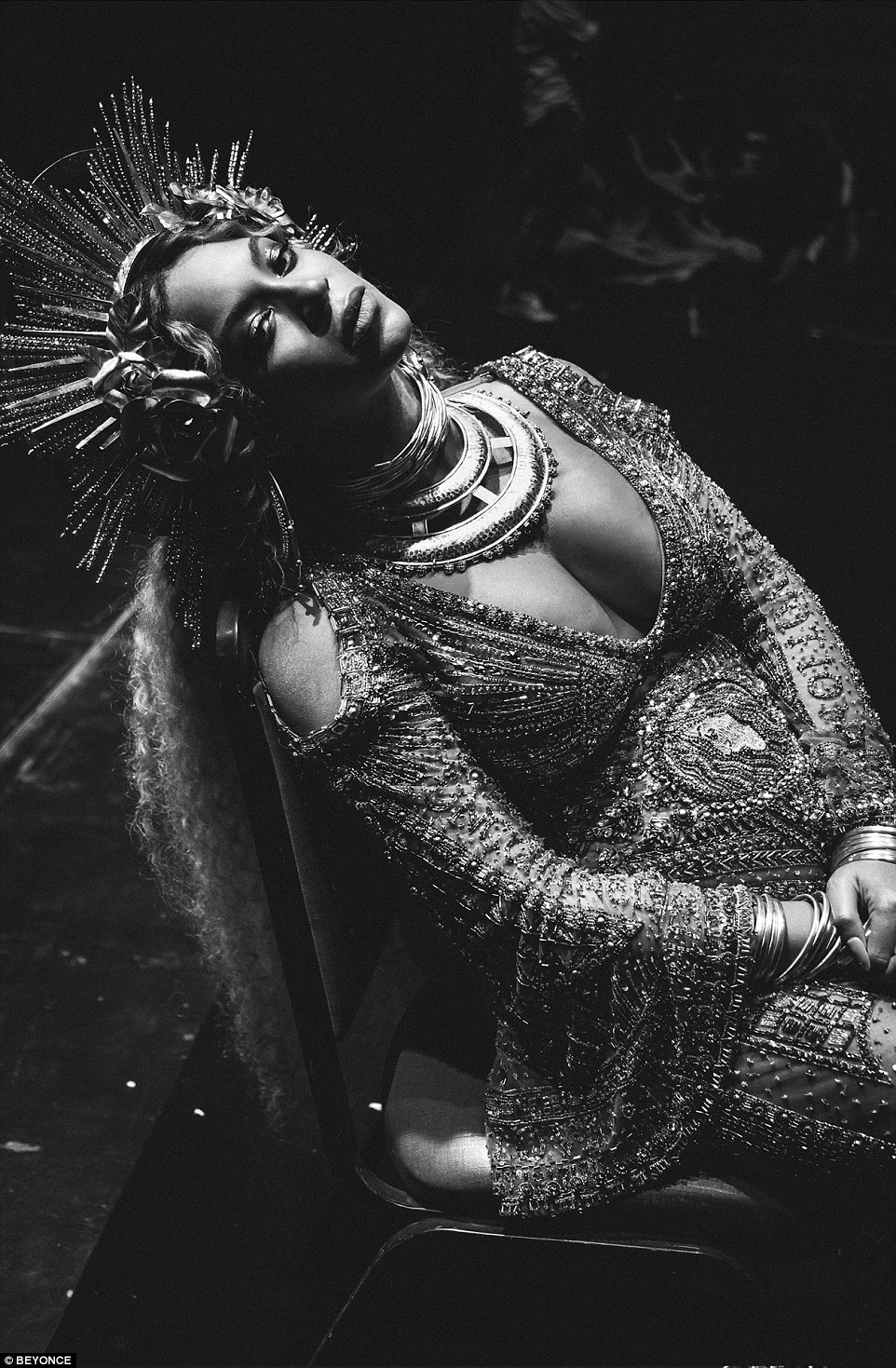 Nonchalant: Bey reclined in another black and white snap, proving she looks glamorous at any angle