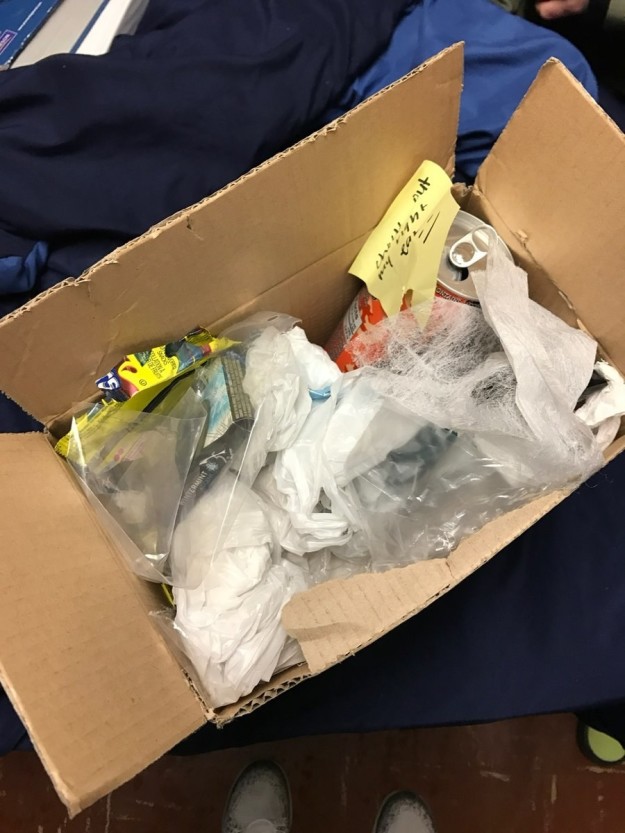 Well, there was a lot of tissue — used tissue. His used tissues. It turned out that his mom had sent him a package of trash he was too lazy to take out when he was home for the holiday break.