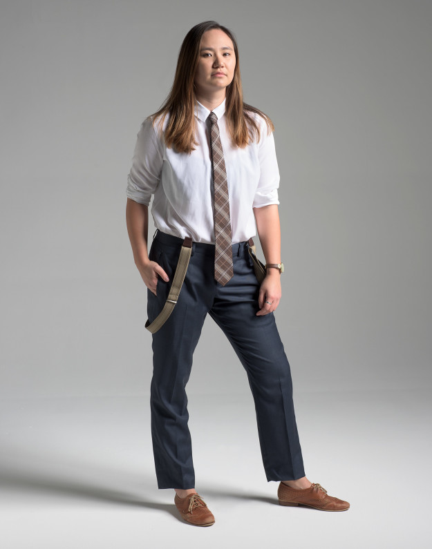 Jen dressed Niki in tailored blue pants, a white button-down, brown suspenders, a brown skinny tie, and brown wing-tip shoes.