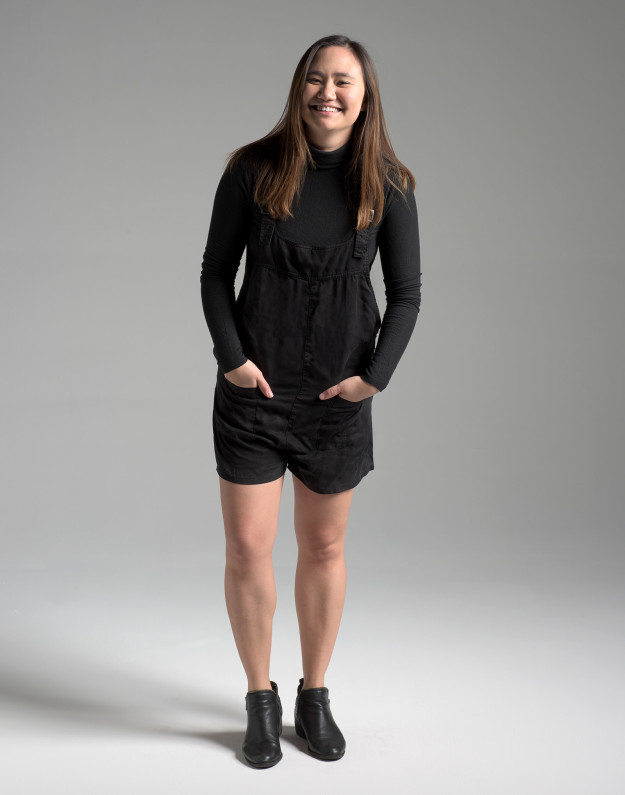 Chantel dressed Niki in a black overall romper, a black long-sleeve turtleneck, and black booties.