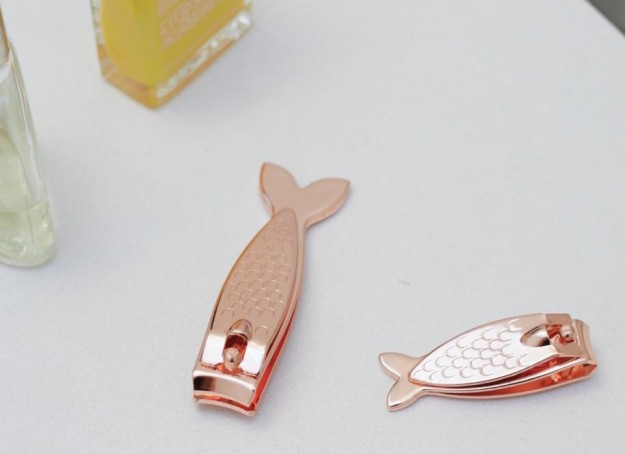 Spruce up your overgrown flippers with mermaid tail nail clippers.