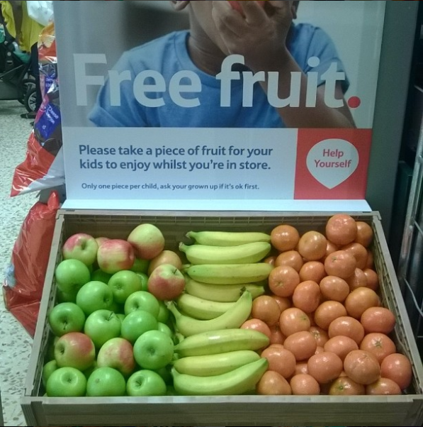 This grocery store that offers kids free fruit so they're busy snacking — and not whining — while their parents shop.