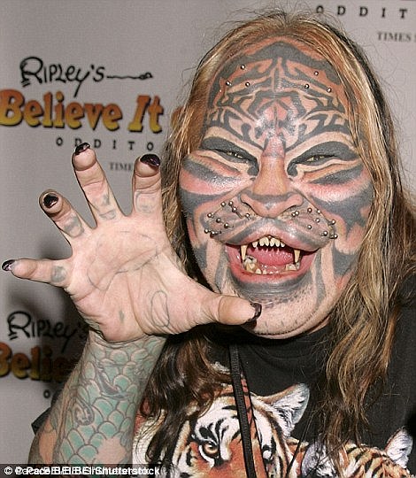 Dennis Avner, also known as the Stalking Cat, was a Nevada man famed for his extreme body modifications who died in 2012 at the age of 54