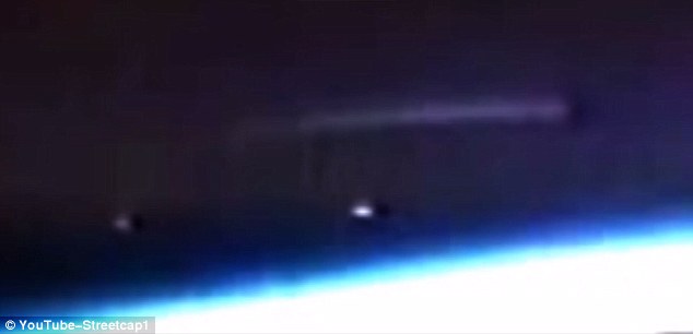 Pictured is the view of the UFO from the International Space Station feed. 'I thought I was seeing things. I had to be quick', wrote the user Streetcap1 in a caption underneath. 