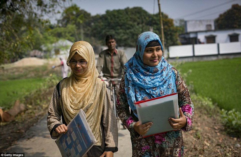 Rani (blue scarf) walks with a friend with her father following on a bicycle to catch a rickshaw to take a school exam. When her boyfriend's family, who are politically connected in the area, discovered the relationship, they insisted for the couple to get married. The boy threatened to kill himself while his family said they would kidnap her if she did not agree