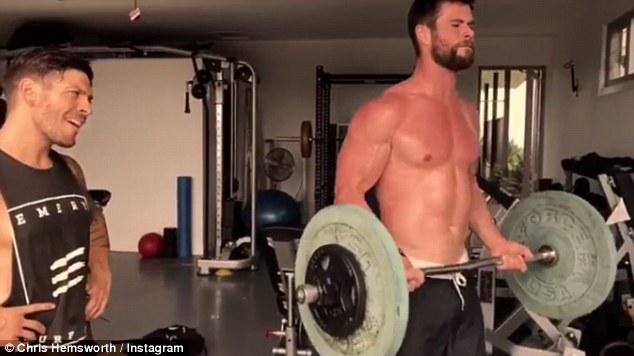 Putting in the hard yards! The Melbourne-born actor's bulging biceps were on full display as he took to lifting heavy weights